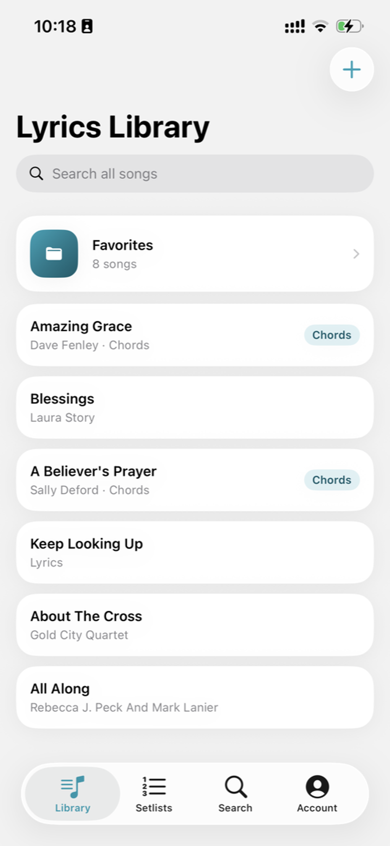 Lyrics Library app showing the Library tab with Favorites and songs